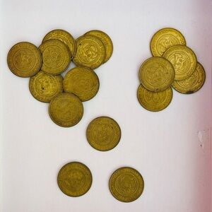 Lot of 17 vintage Chuck E Cheese tokens